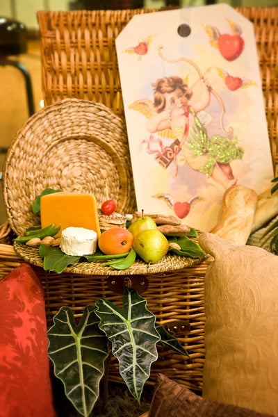 picnic gift basket with delicious cheese and fruits