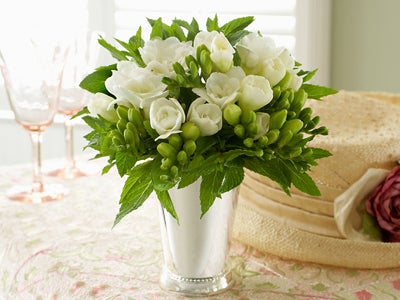 Mind and White tulips as beautiful centerpiece