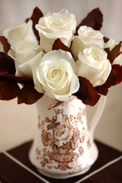 Silver Pitcher with White Roses