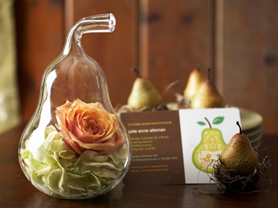 Rose and flowers inside glass pear invite