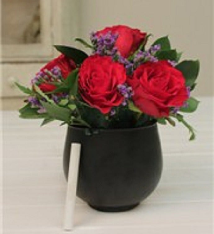 Red Roses in a Chalkboard Vase