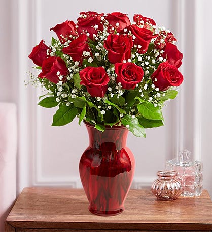 Premium Photo  Beautiful red rose flower with hearts and gift box