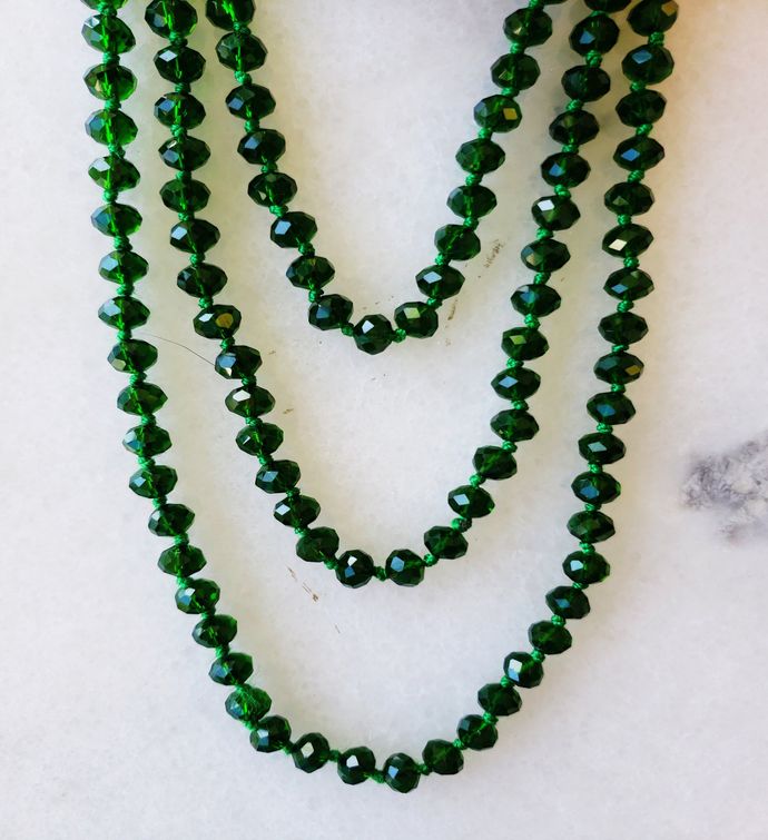 Green Crystal Necklace Delicately Spaced With Decorative Knot ...