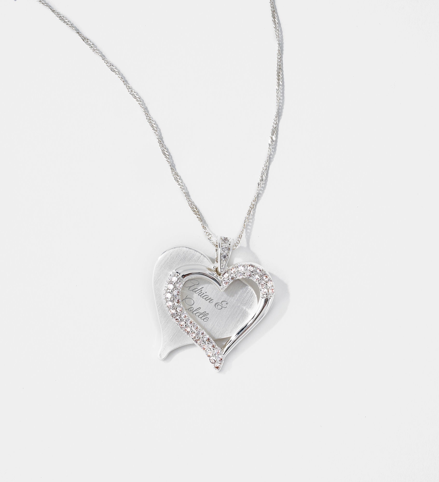 Kittenish Engraved Silver Brushed Heart Swing Necklace
